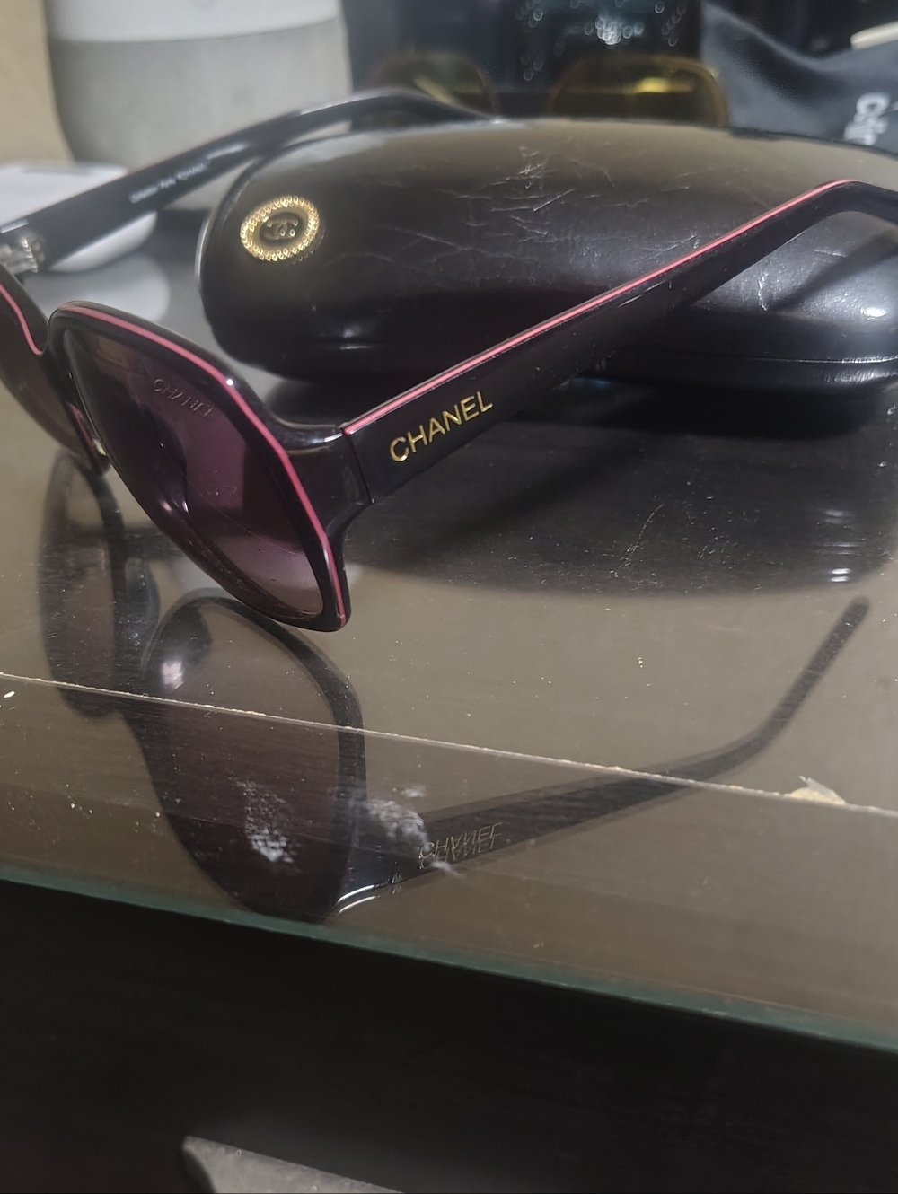 CHANEL Black Sunglasses with Pink Trim and Purple Lenses